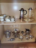 Multiple items including carafe, pitchers, cake dish, ice bucket, scoop