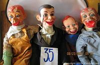 Group shot of four ventriloquist dummies