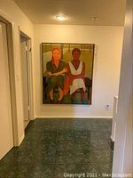 Frontal view of the full painting hanging on wall over tiled floor