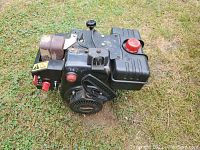 Top and side view of the 10.5hp gasoline engine showing fuel tank, pull-start, and control buttons.