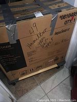 Boxed Henshaw AquaSource toilet with model number 0810485 and quantity 1