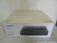 Box front displaying the Sony brand, product image of the turntable system, model PS-LX310BT, and Bluetooth connectivity logos.