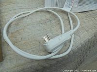White power cord with plug for the Toshiba window air conditioner unit.