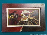 Photo showing the full painting titled Romantic Dance with musician and dancer in abstract style framed in textured reddish-brown frame.