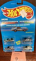 Front of original Hot Wheels Micro Chroma Racers card showing four chrome mini cars sealed in blister pack.
