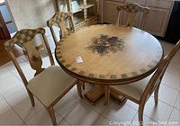 Round table with four matching chairs, full set overview