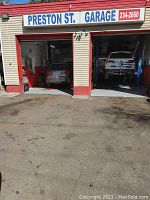 Exterior of Preston Street Garage showing signage