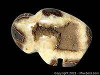 Front side of the geode buffalo sculpture showing natural crystal interior and polished exterior.