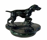 Front view of the Pointer dog dresser tray showing the ceramic detailed dog in a pointing stance on the oval base.