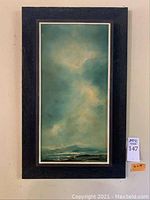 Front view of Bob Pepper seascape in dark stained wood frame