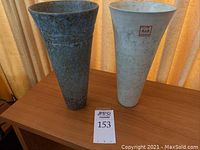Two conical vases, front view