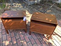 Both nightstands shown side by side on brick surface outdoors