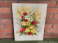 Full view of the vintage oil on board painting showing colorful floral arrangement in red, yellow, white, and green hues against a neutral gray-beige background.