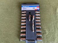 Mastercraft 20-piece 1/2" drive socket set displayed in original package showing two rows of sockets, ratchet handle, and extension bar on green background.