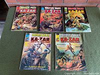Five vintage 1974 "Savage Tales" KA-ZAR comic books issues 6,7,9,10,11 showing colorful adventure covers.