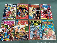 Eight Marvel Age comic books from 1983 arranged in two rows showing front covers with various superheroes in detailed colorful artwork.