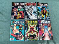 Overview of six Marvel Comics Iron Man issues 181-186 arranged on a surface.