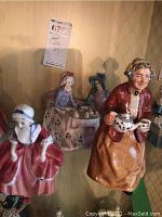 Overall view of three figurines on display