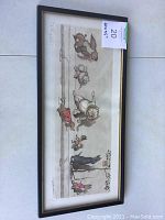 Full view of framed print showing dog illustration and frame