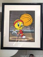 Full frontal view of framed Tweety Bird animation cel