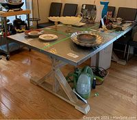 Front view of table in room with decorative items on top