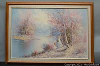 Framed landscape oil painting signed Dupont, depicting two girls by waterside with trees, in pastel colors.