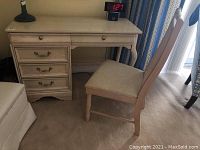 Full view of vanity desk and chair set showing overall appearance and finish