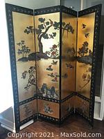 Overall front view of lacquer screen showing four gold panels with bird and landscape motif