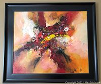 Front view of the framed abstract oil painting showing vibrant colors and signature.