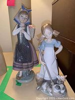 Two figurines side by side showing overall appearance