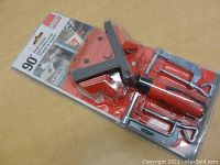 Bessey 90 Degree Angle Clamp in original sealed packaging showing the clamp and its 90 degree angle bracket with handles.