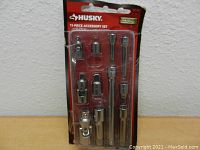 Husky 11-piece socket accessory set sealed in packaging. Items clearly new and chrome finished.