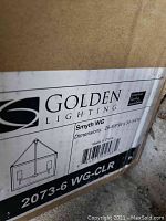 Box label showing brand Golden Lighting, product line Smyth WG, and dimensions 26 5/8" W x 30 3/4" H.