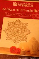 Photo of Avignon Medallion Mandala Stencil packaging showing the mandala design and branding.