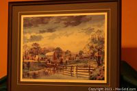 Framed print of countryside landscape by Michael Sloan with black and antique styled frame.