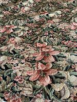 Fabric spread flat to show overall floral pattern