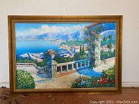 Full frontal photo of the original oil painting showing the framed coastal landscape scene with boats, terrace, and flowers.