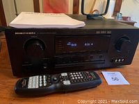 Front view of Marantz SR6300 with remote and manual