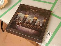 Closed collector's edition box featuring artwork of a throne room with the Rush logo and title A Farewell to Kings.