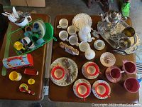Overall view of the entire lot including tea sets, miniature lunch box, and accessories