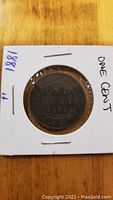 Obverse side showing 'ONE CENT 1881' with wreath details