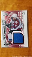 Front side of Upper Deck MVP Peter Forsberg hockey card showing player image and embedded blue jersey patch.