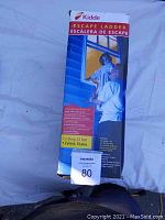 Front and top side of Kidde escape ladder box showing product image and basic description.