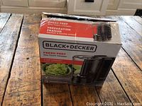 Box front shows product image and branding for Black+Decker Fresh Prep One-Touch Chopper with 3-cup capacity.