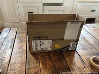 Cardboard box labeled 'Wireless Signal Solution' that contained the kit.