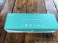 Photo of the front of the closed product box showing the brand name AweSafe and product name HD Rear-View Mirror Recorder along with icons representing features.