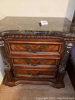 Front view of nightstand showing overall design and drawer layout