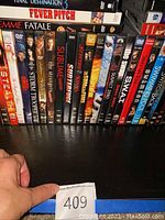 Photo showing a variety of DVDs including titles like Final Destination 3, Fever Pitch, Femme Fatale, Stealth, Storm Trooper, Sublime, The Stepfather, Superfrog, Suspect Zero, S.W.A.T., Switchback, Swimming Pool.