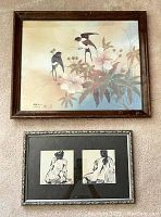 Photo of two framed art pieces: top is an 18x22.5 inch Johnny Lung lithograph titled Chickadee with birds and flowers in a brown wooden frame with signs of damage; below is a framed pair of black and white Asian nude sketches in a black double mat frame sized 11.5x17 inches.