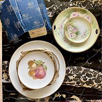 Large serving platter with grapevine style molded edges, along with stacked plates and the vintage rose motif tray and dish